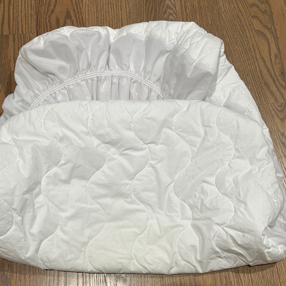 Like new Pottery Barn kids White quilted crib mattress pad.